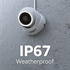 Close up of a weatherproof Lorex camera on a gray wall with water droplets and IP67 Weatherproof label