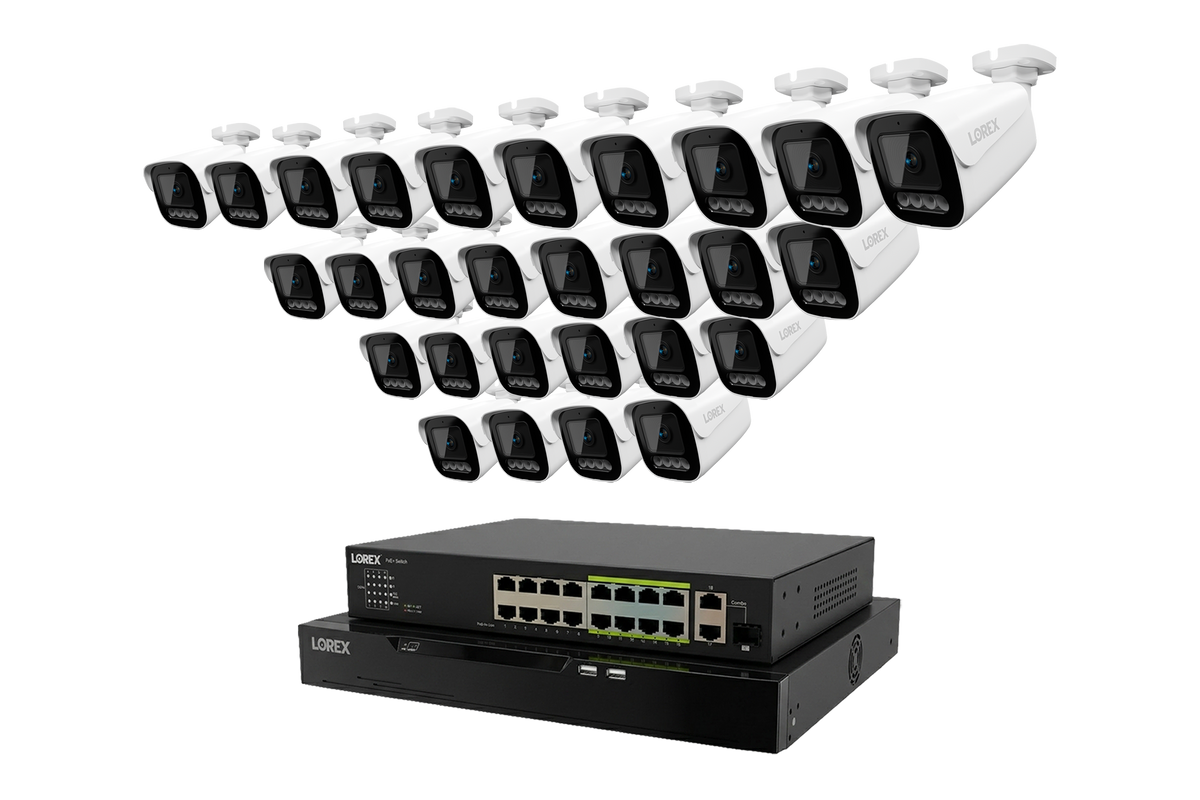 Close view of white Lorex X3 bullet cameras with the NVR beneath displaying network ports