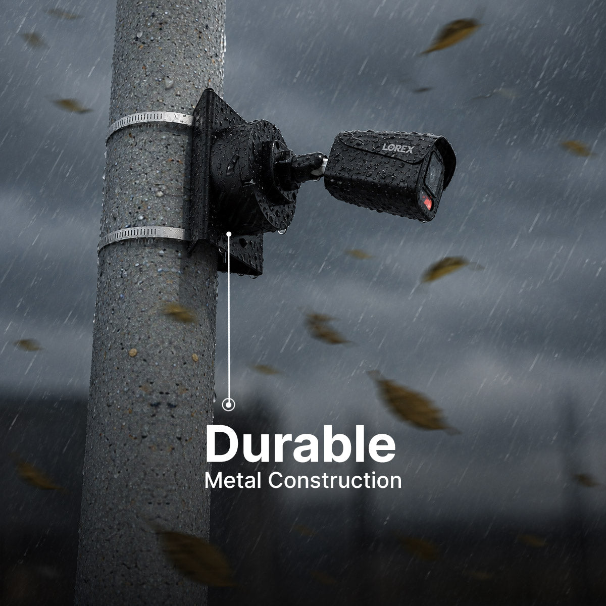 Lorex surveillance camera mounted to a weathered metal pole in rain
