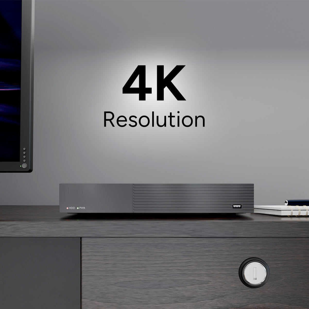 Lorex DVR on a desk with a large 4K Resolution graphic in the background