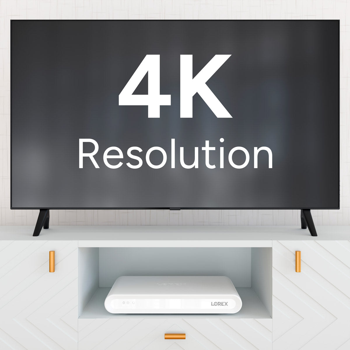 4K television on a stand with a Lorex VC 4K NVR tucked under the shelf in a modern cabinet