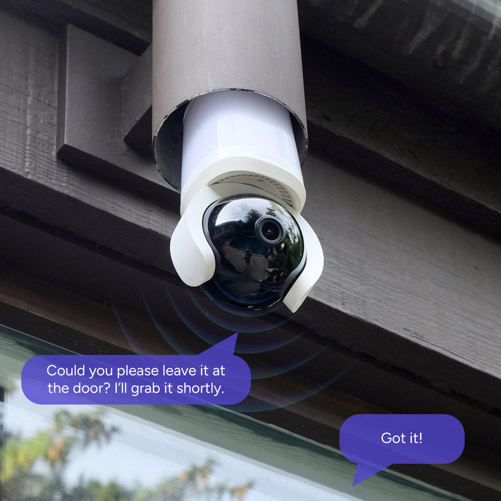 Outdoor Lorex Connect 2K Wi-Fi smart lightbulb pan tilt camera mounted under a wooden eave