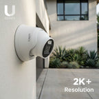 Lorex Connect U Series 4K 8-channel wired NVR system with U3 2K+ PoE turret cameras installed on a modern house