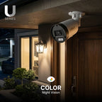 Lorex U Series bullet camera mounted under a porch at night with color night vision