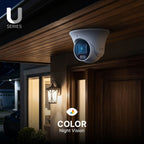 Lorex U Series outdoor camera with color night vision mounted under a porch eave at dusk