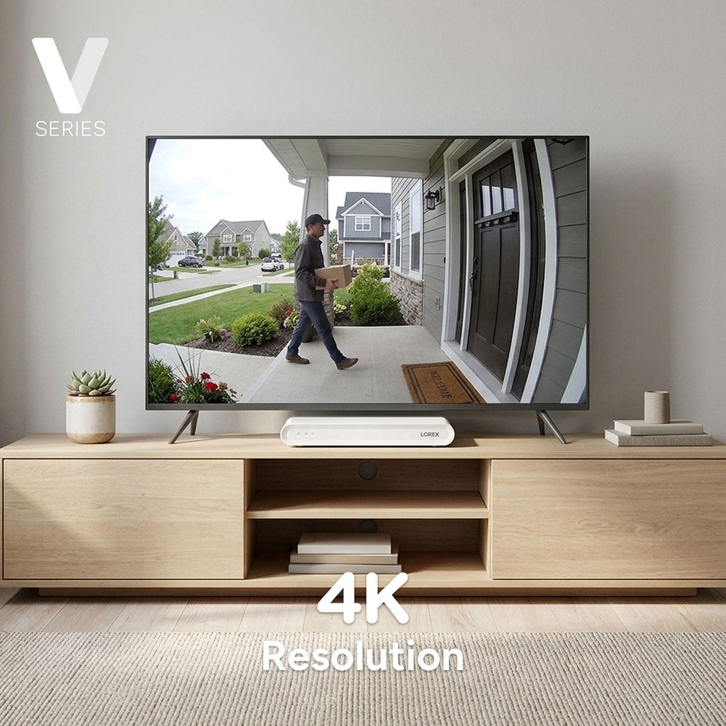 Lorex Connect VF 4K NVR on a wooden media console under a large flat screen TV